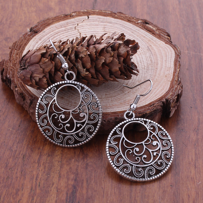 Silver Swirl Medallion Earrings